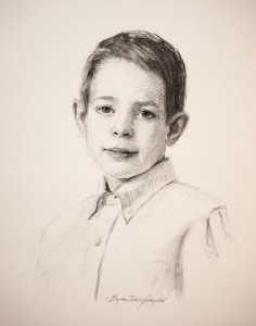 Charcoal portrait of a young man in charcoal.