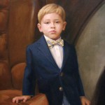Portrait of a young boy in a bow tie.